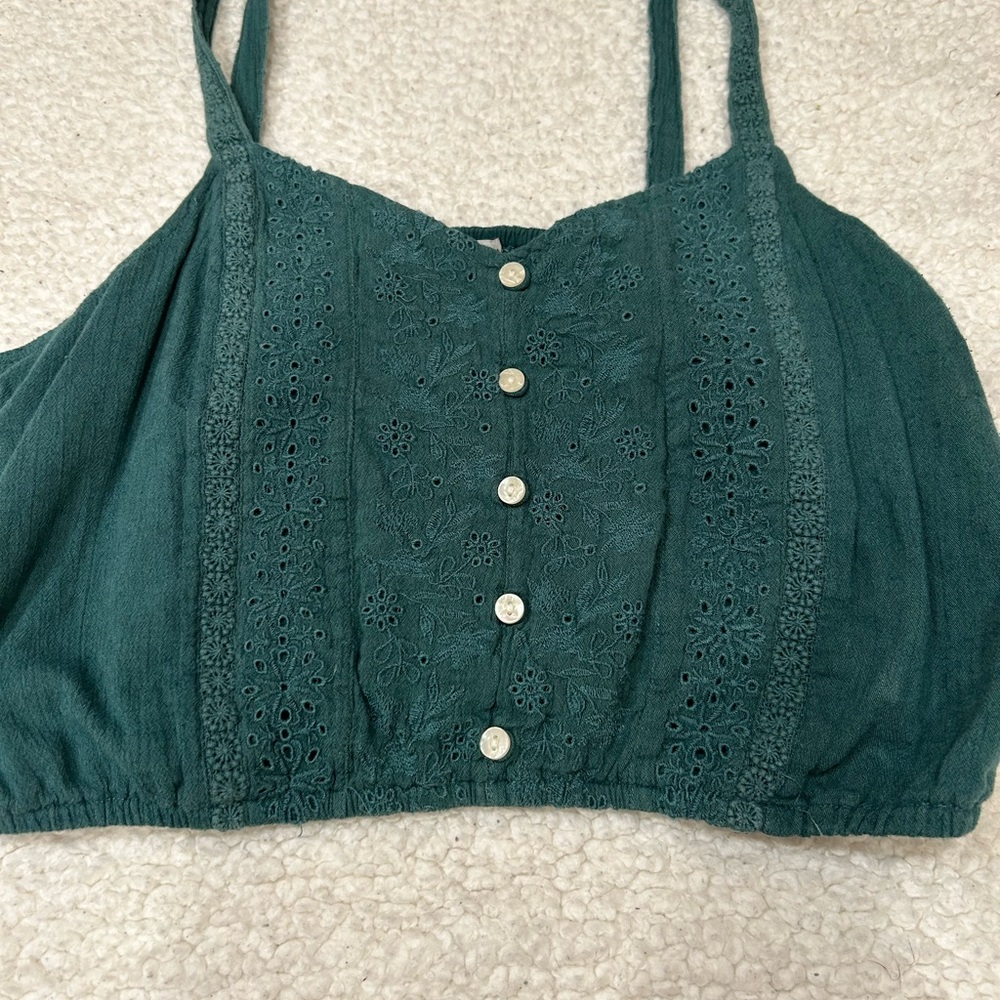 American Eagle turquoise tank top with flower and button details